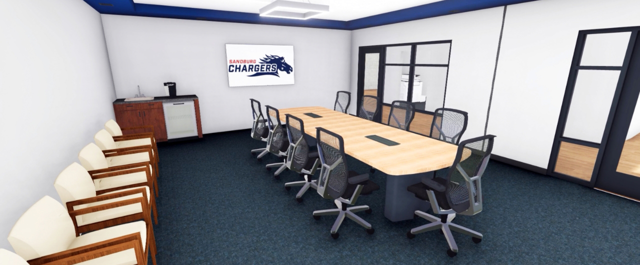 Conference room with table and chairs.